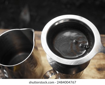 The coffee brewing process uses the V60 technique to create a delicious taste.