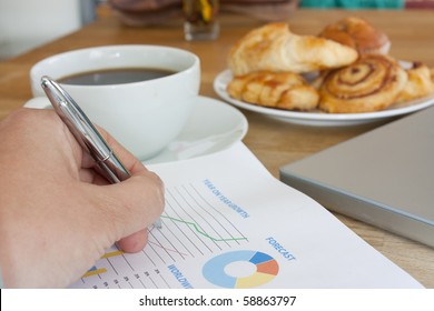 Coffee, Business Data And Hand Working At Breakfast Meeting