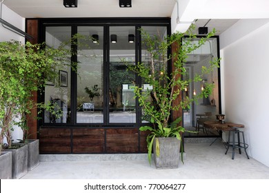 Coffee Cafe Exterior And Front Store Decorated With Wood Panel And Eco Furniture Design