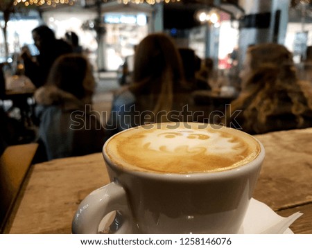coffee cappuccino on wooden table in coffee shop food background