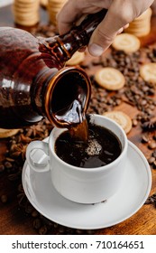 coffee from ceramic ware,

pouring coffee