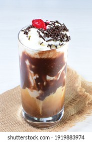 
Coffee And Chocolate Milkshakes, With Chantilly Cream On White Wooden Background