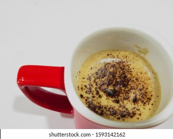 Coffee With Coca Powder On A White Surface (top View)