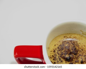 Coffee With Coca Powder On A White Surface (top View)