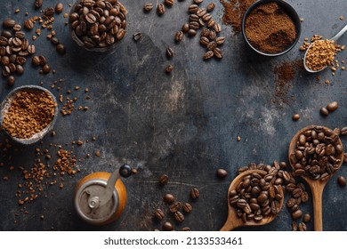 Coffee concept with differents types of coffee, coffee beans, milk and cinnamon sticks on grey background. Flat lay