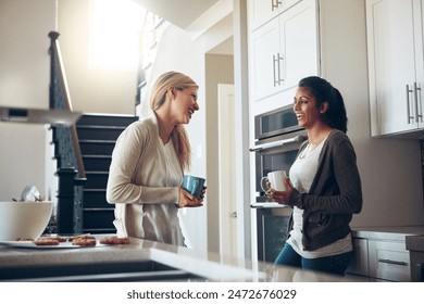 Coffee, conversation and smile with friends in kitchen of apartment together for bonding. Diversity, funny and morning with happy roommate people in laughing apartment for comedy, humor or joking - Powered by Shutterstock