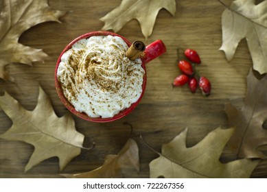 Coffee With Cream Topping And Pumpkin Spice, Or Pumpkin Spice Latte. Autumn Hot Drink Concept. View From Above.