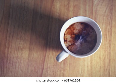 Coffee And Creamer In Cup