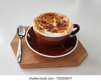 Coffee Creme Brulee Latte And Wooden Tray On White Background