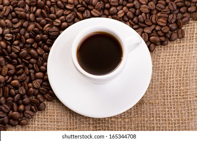 coffee cup with coffee beans 