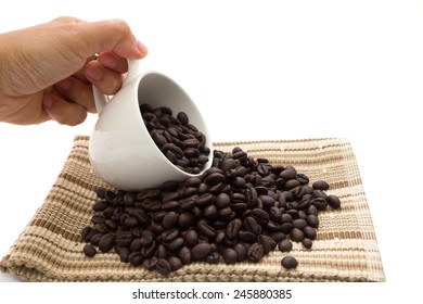 Coffee cup with coffee beans