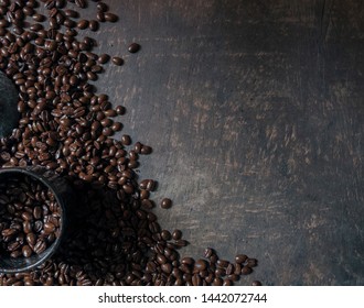 
Coffee cup and coffee beans on the wooden floor. Top view with copy space for your text - Shutterstock ID 1442072744