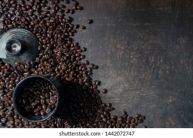 
Coffee cup and coffee beans on the wooden floor. Top view with copy space for your text - Shutterstock ID 1442072747