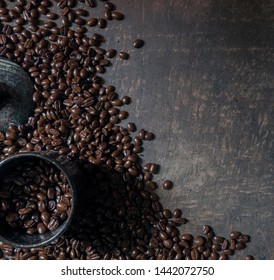 
Coffee cup and coffee beans on the wooden floor. Top view with copy space for your text - Shutterstock ID 1442072750