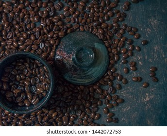 
Coffee cup and coffee beans on the wooden floor. Top view with copy space for your text - Shutterstock ID 1442072753