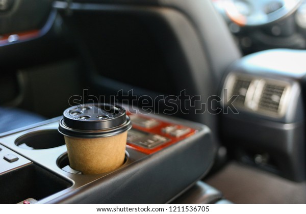 Coffee cup in car\
holder