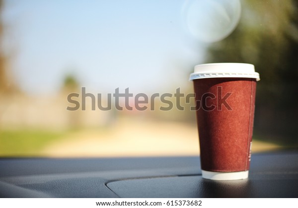 coffee cup and car interior\
