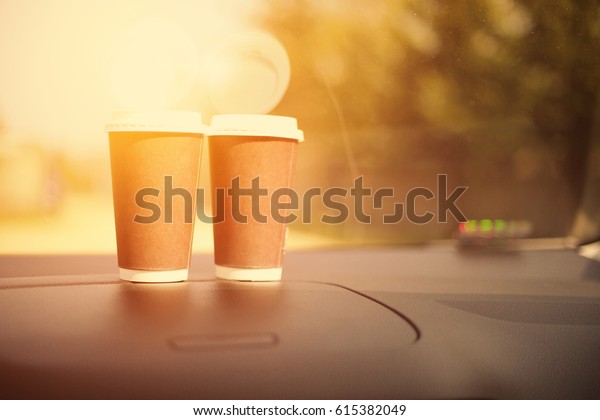 coffee cup and car interior
