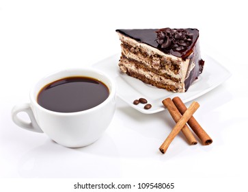 Coffee Cup, Chocolate Cake And Cinnamon Sticks On White Background