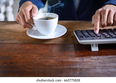 coffee cup clock and work on table  the good morning