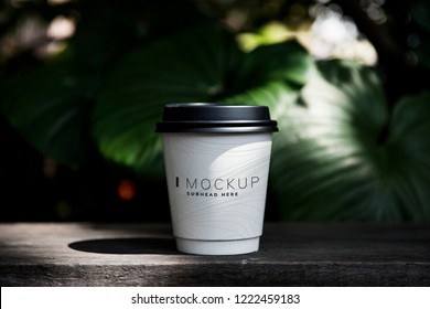 Coffee cup mockup on the table