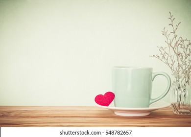 Coffee Cup Mug With Red Heart Shape On Wooden Table , Romance And Love Valentines Day Background Concept