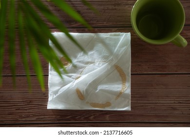 Coffee Cup And Napkin With  Coffee Stain 