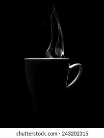 Coffee Cup On A Black Background With Steam