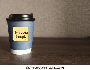 Coffee Cup On Copy Space Background With Text Note Written Breathe Deeply, Concept Of Self Reminder To Calm Down And Lower Stress In The Body, Inhale Exhale Deeply And Concentrate To 