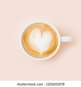 Coffee Cup On Pale Pink Background. Flat Lay, Top View 