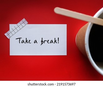 Coffee cup on red background with handwritten stick note TAKE A BREAK, means to stop doing something for a while, to rest when feeling tired, committed partners mutually agree to pause relationship - Shutterstock ID 2191573697
