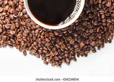 Coffee Cup On Spilled Coffee Beans White Background