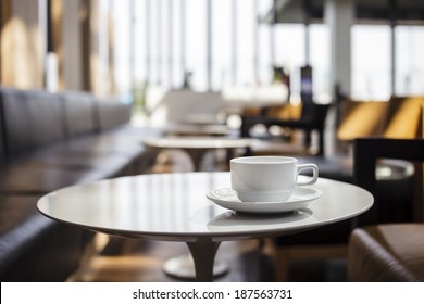 Coffee Cup on table Cafe shop Interior Blur people background - Shutterstock ID 187563731