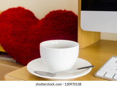 Coffee Cup on the Table with Computer Keyboard for Business Concept.