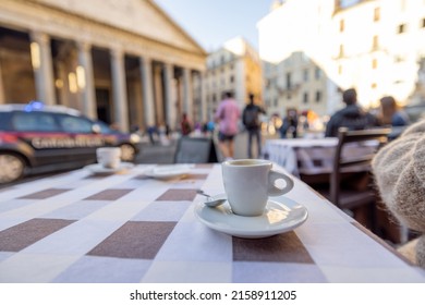 Coffee Cup On A Table At Traditional Cafe In Rome City. Concept Of Italian Coffee And Travel