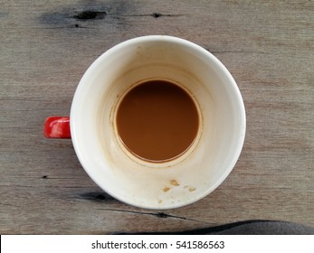 coffee cup on table, view from above
