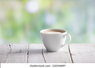 Coffee Cup On A Wooden Table