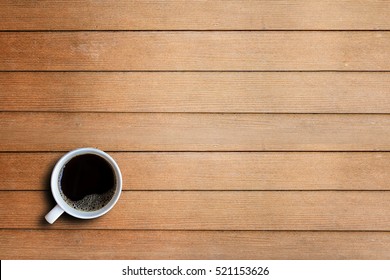 Coffee Cup On Wooden Table Background With Copy Space. Top View