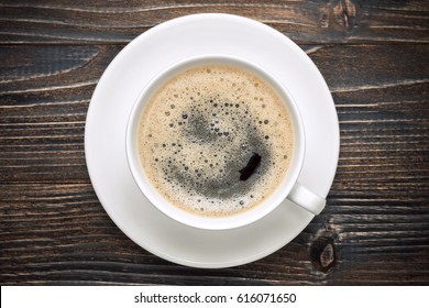 Coffee cup on the wooden table. - Shutterstock ID 616071650