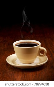 Coffee Cup On Wooden Table