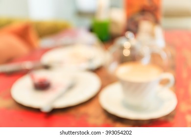 coffee cup set on table in blurred and de-focus