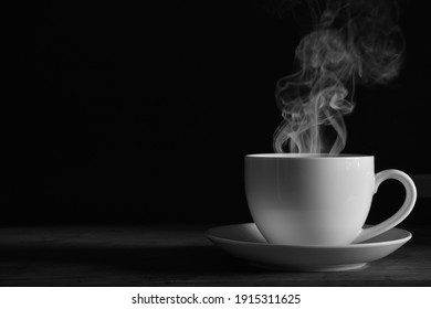 coffee cup smoke black background Black and white photo - Powered by Shutterstock