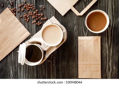 Coffee Cup Take Away At Wooden Background Top View