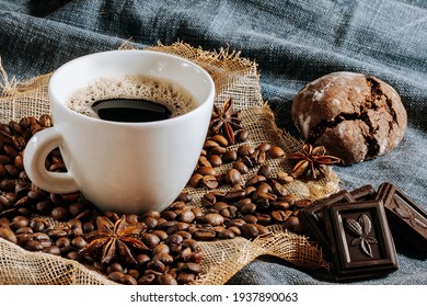 Coffee cup, tasty cookie and chocolate 