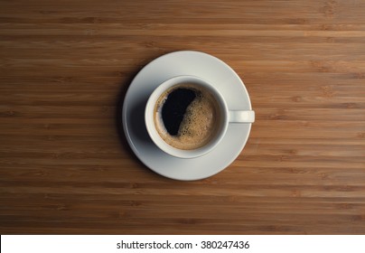 Coffee Cup Top View On Wooden Table Background