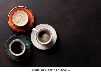 Coffee Cups On Old Kitchen Table. Top View With Copyspace For Your Text 