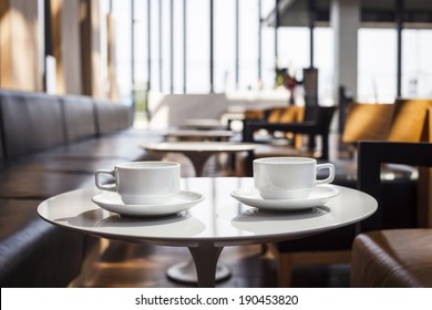 Coffee Cups On Table Blur Restaurant Cafe Interior Background