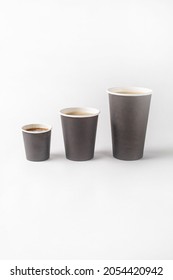 Coffee In Disposable Paper Cups Of Different Sizes, Large, Medium And Small Volume. Fast Food