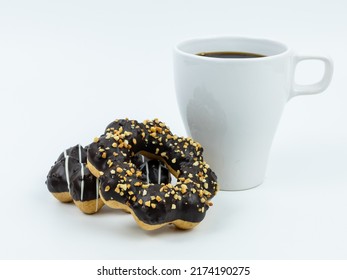 coffee and donuts for breakfast on white background - Shutterstock ID 2174190275