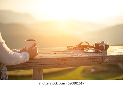 Coffee Drink.  Asian Girl Or Woman Life Happy And Relax  Drinking Coffee And Tea In Sun Sitting Outside In Sunshine Light Enjoying Morning, Sunrise Background. Vintage.  Lifestyle Concept